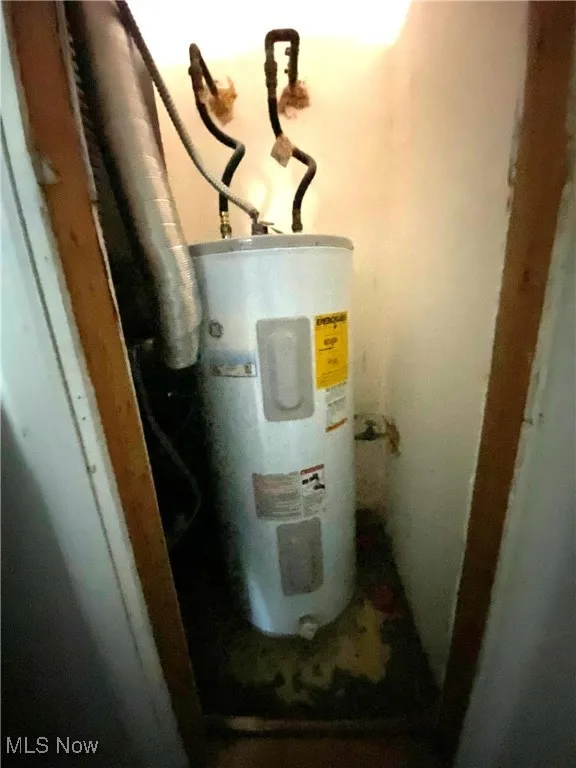 Hot Water tank closet behind bedroom closet
