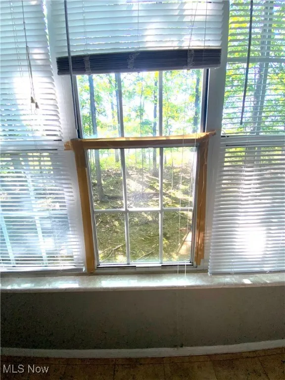 Window with broken latch.