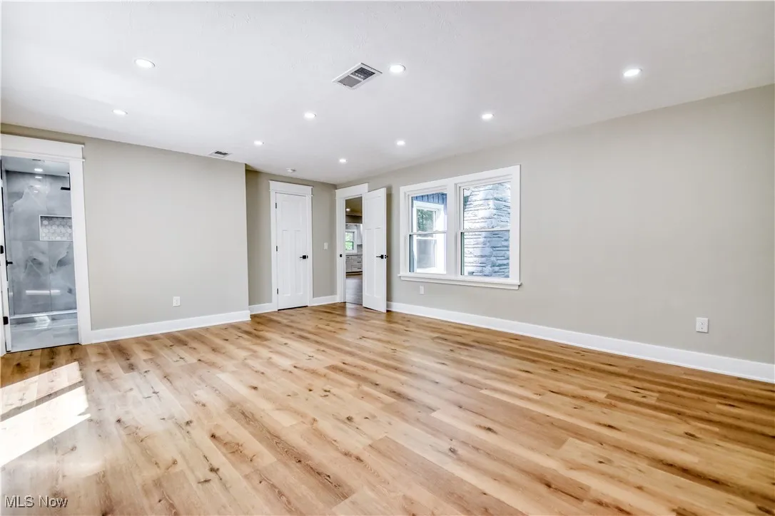Unfurnished room with recessed lighting and light wood-style floors