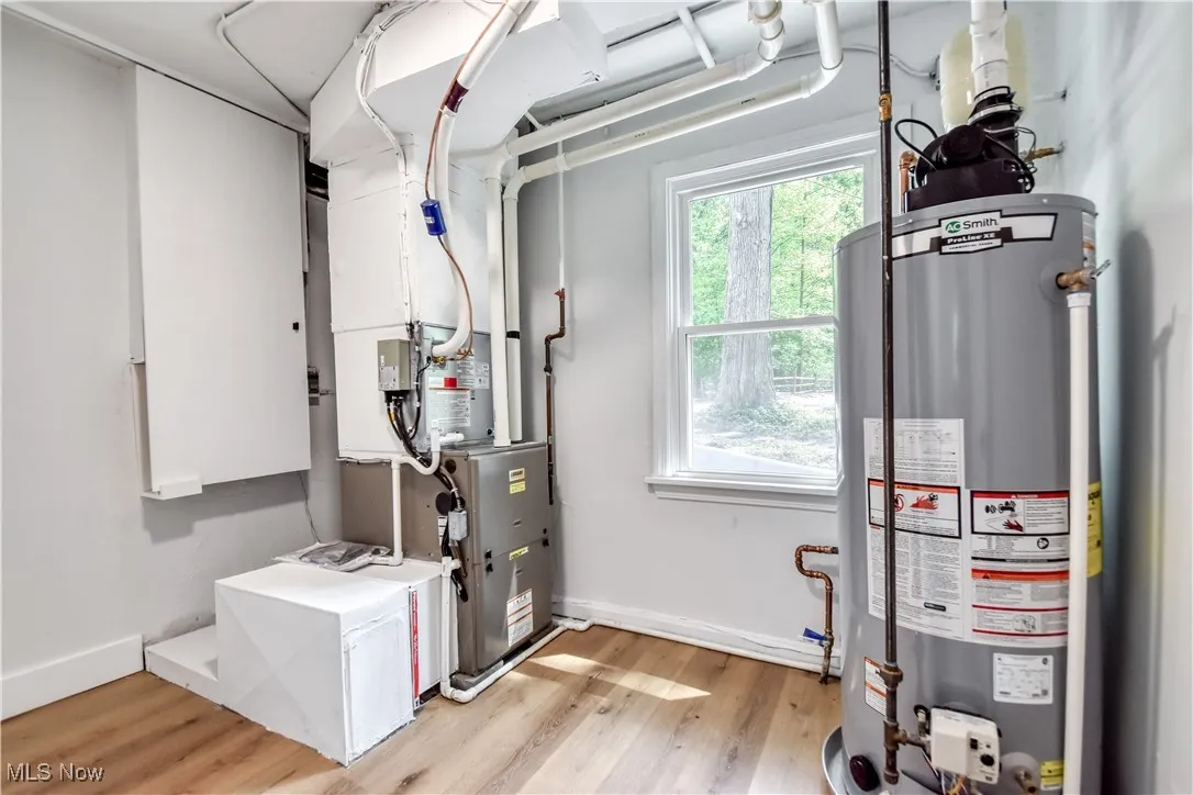 Utility room with gas water heater