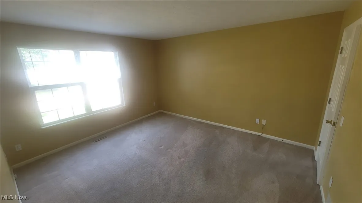 1st floor bedroom with carpet