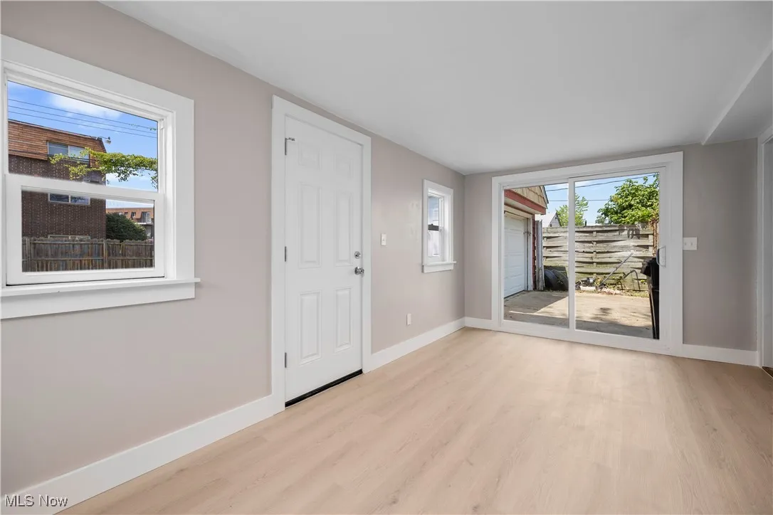 Foyer entrance featuring baseboards and light wood-style flooring