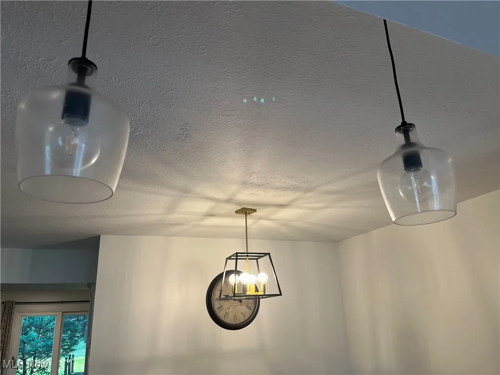Modern Light Fixtures in the Kitchen and Dining Room