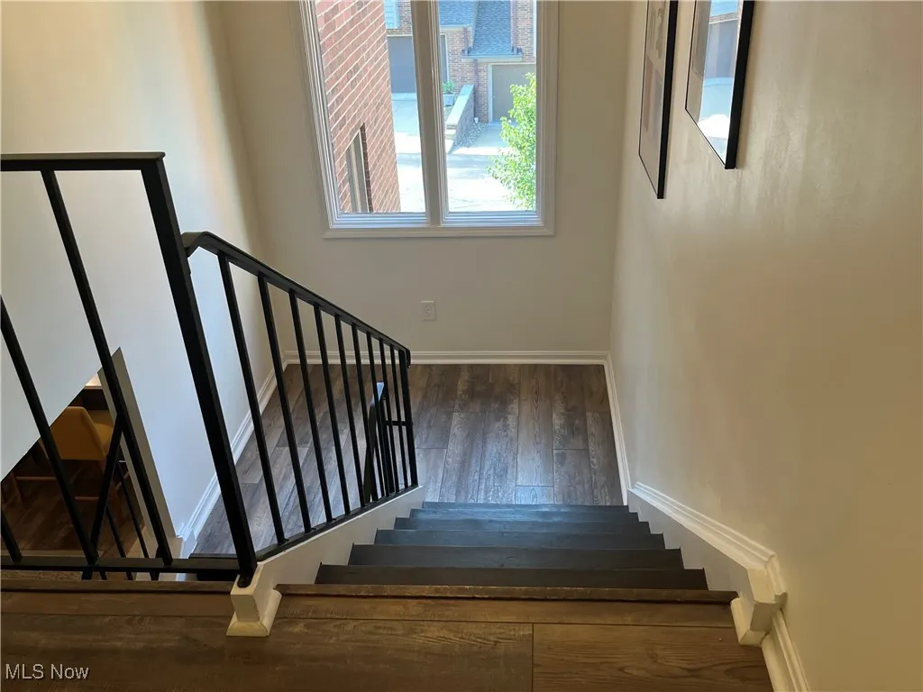 Staircase with beautiful wood-like finished floors ---