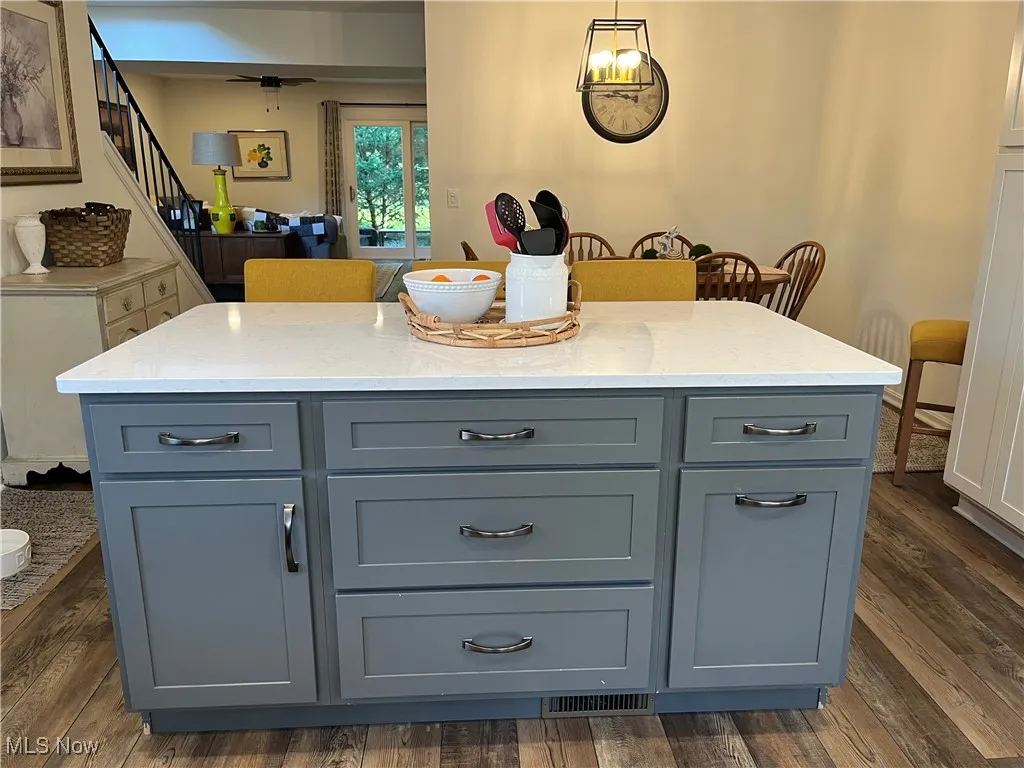 The Kitchen Island is not only stylish, but so functional. It has seating on one side and multi-drawers for extra storage on the other side.