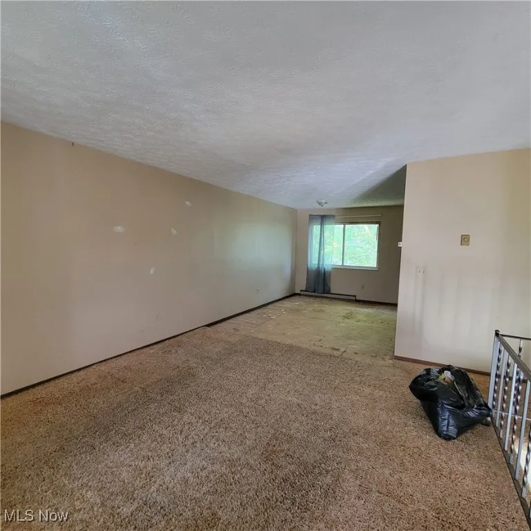 Looking from front window through dining area
