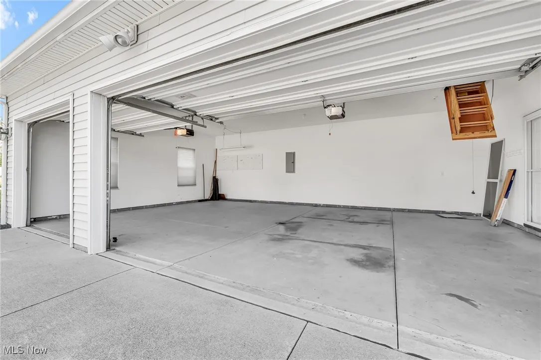Garage featuring electric panel