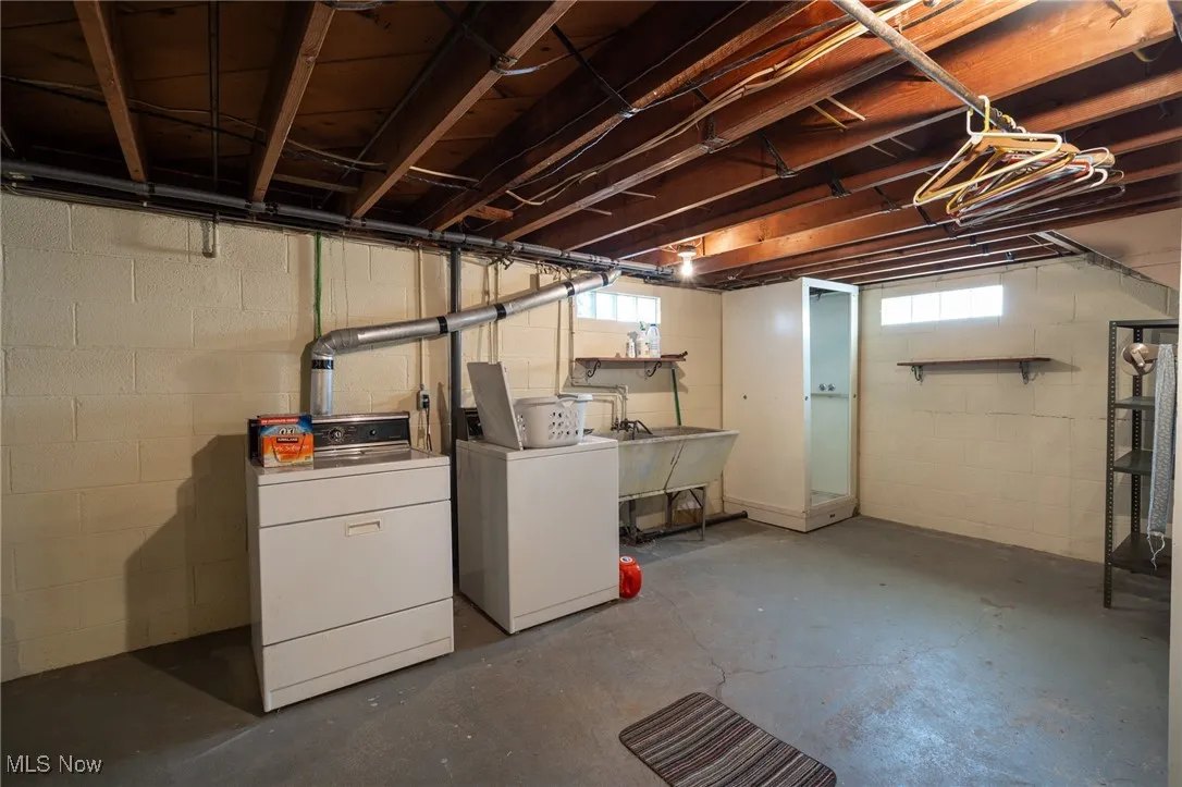 Washer, dryer, stationary tub and shower stall