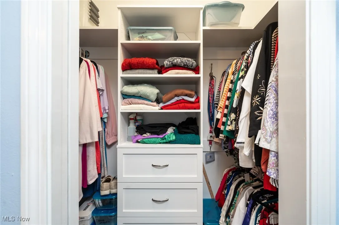 Second organized closet in the primary bedroom