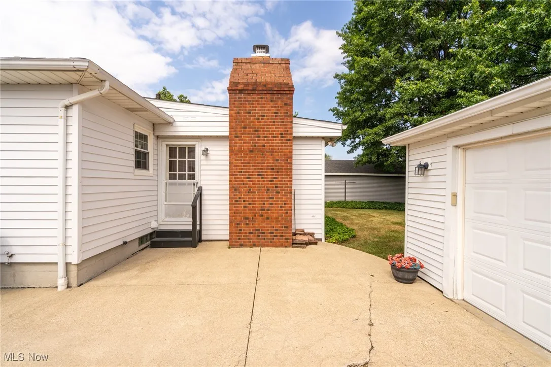 Door from family room to patio; garage