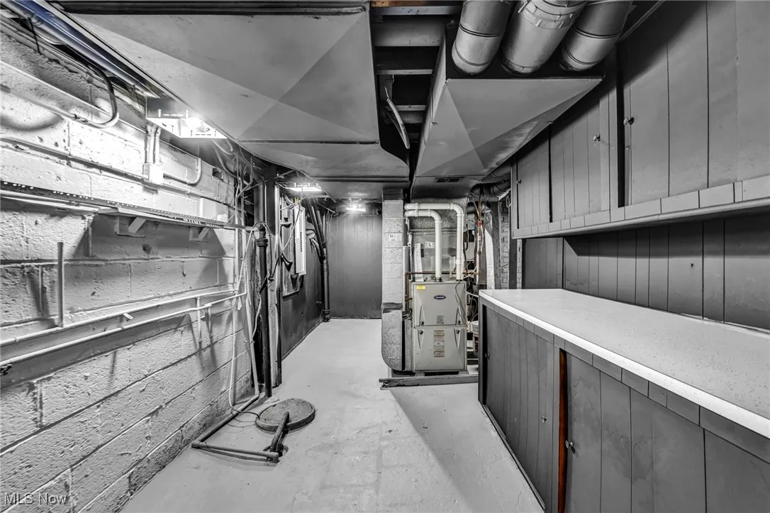 Unfinished basement with heating unit