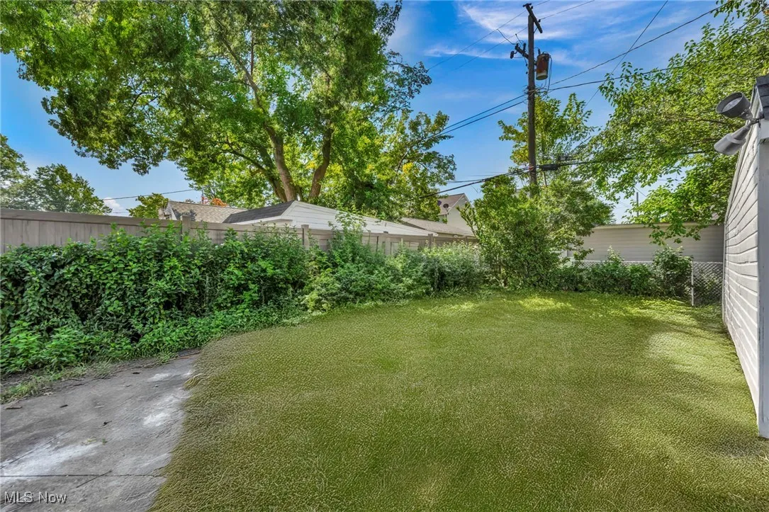 View of fenced backyard