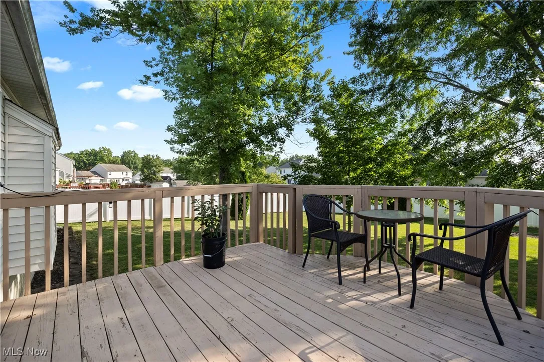 Deck featuring a yard