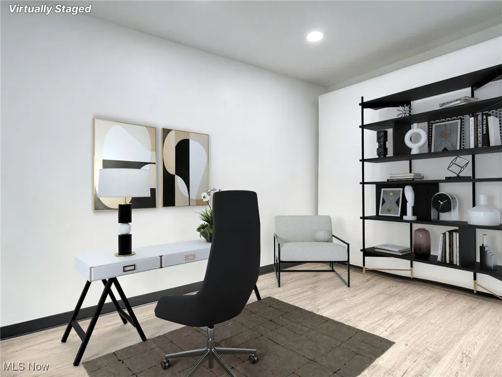 virtually staged-Office area with light wood finished floors and recessed lighting