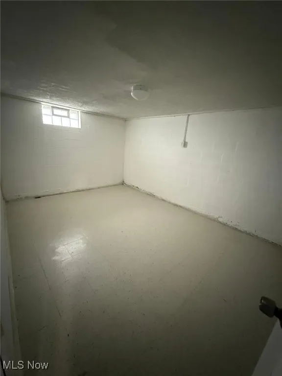 Basement with tile patterned floors
