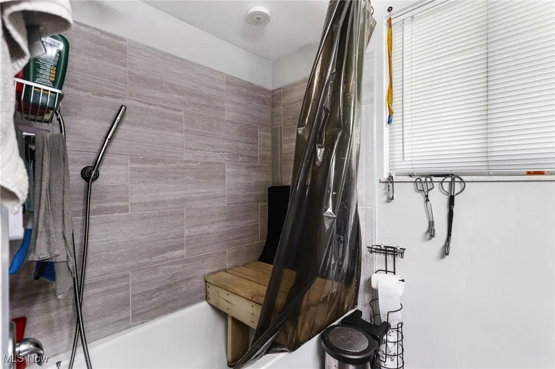 Full bathroom featuring shower / tub combination