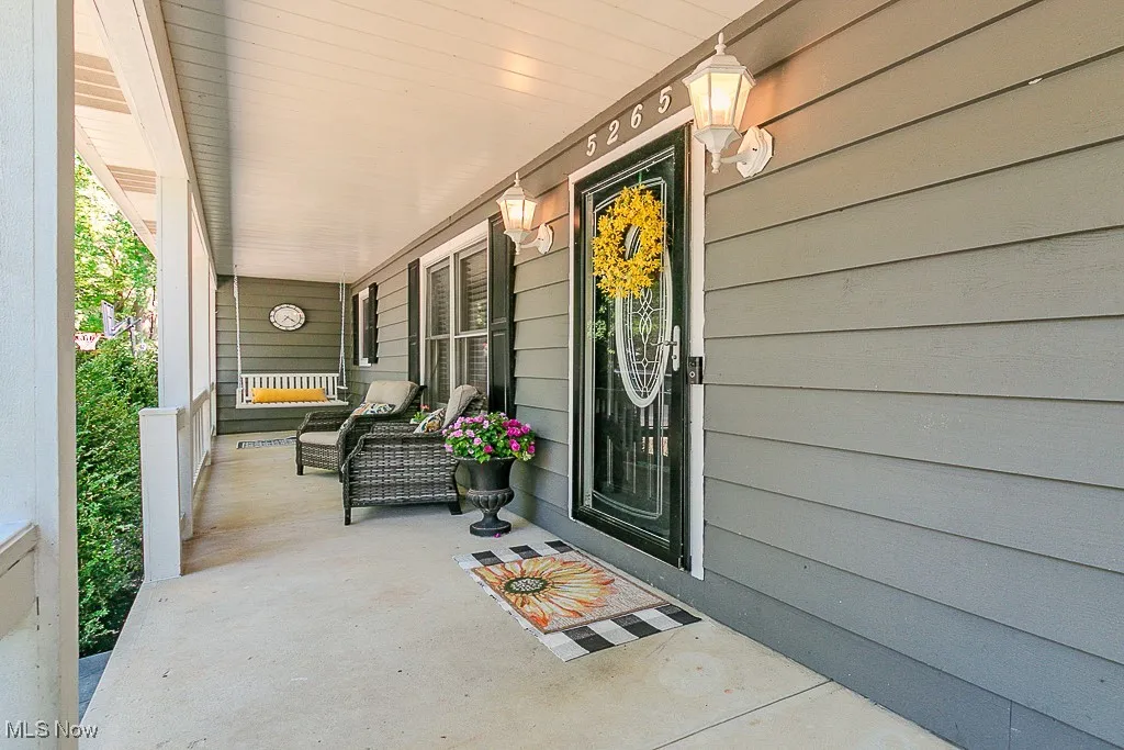 Entrance to property with a porch
