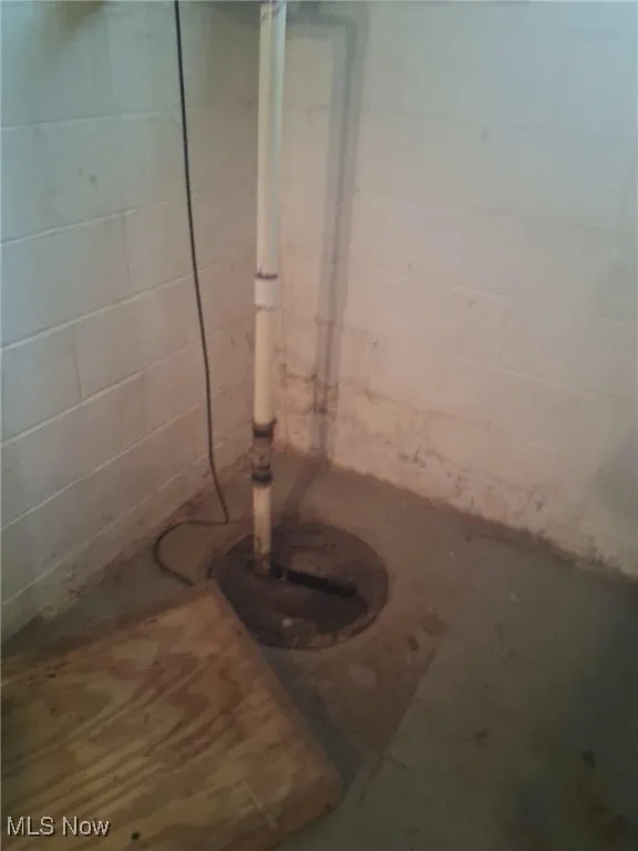 Unfinished basement with drainage system