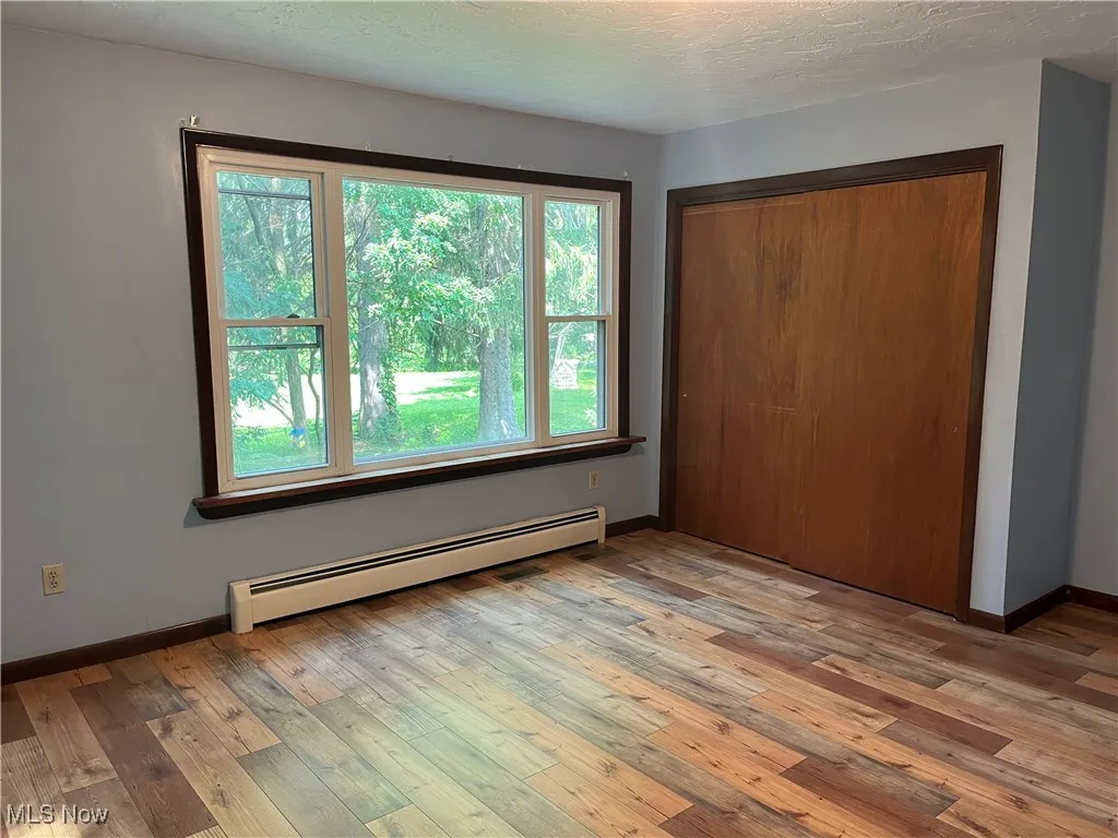 Bedroom three has laminate flooring and flooded with light!