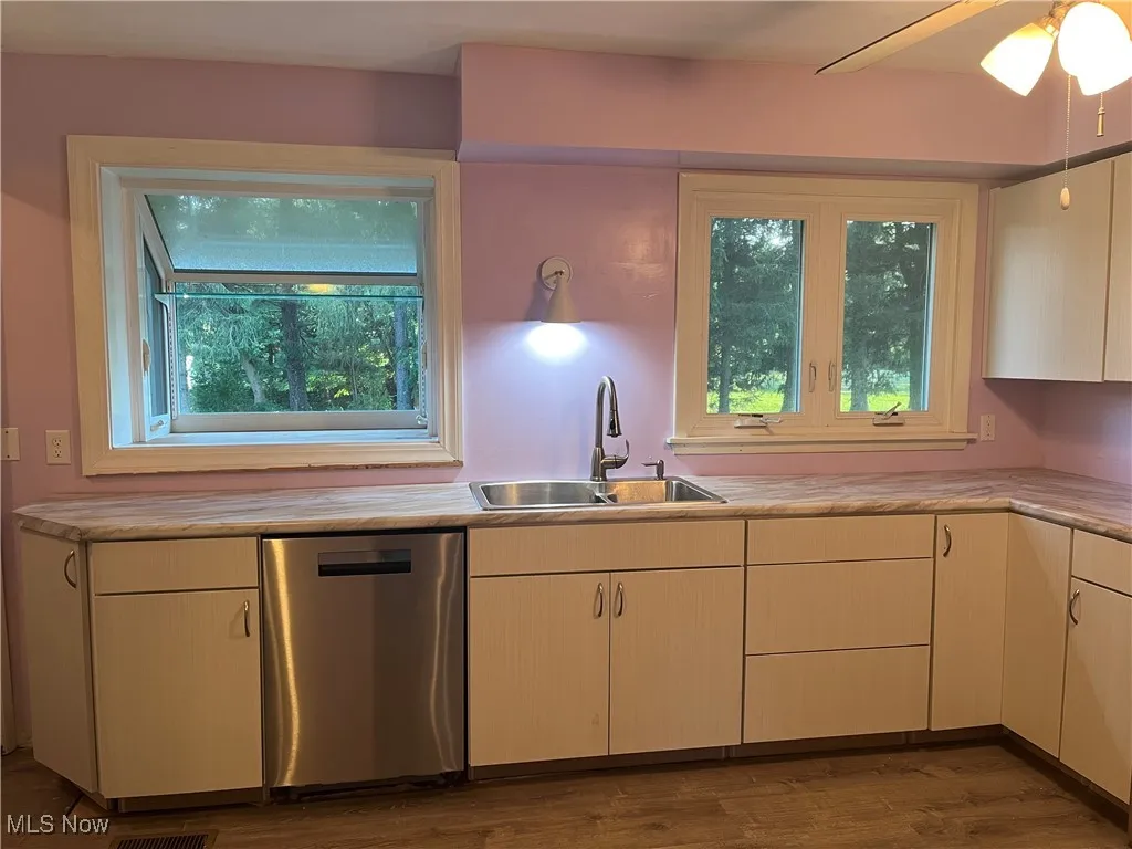 Newly remodeled, with stainless appliances, sink & faucet and a garden window.