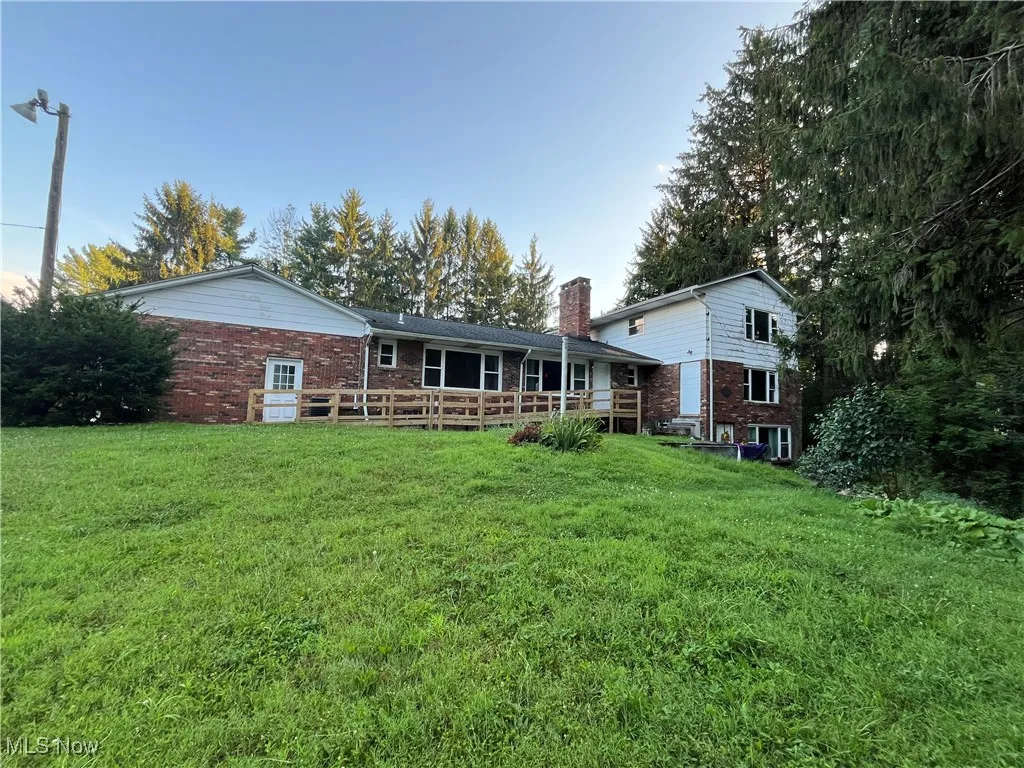 Back of house has a disability ramp.