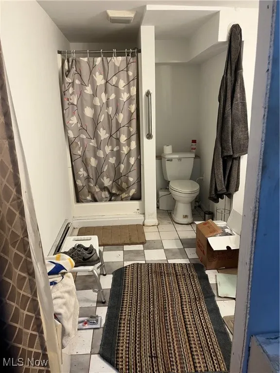 Full bath in bsmt. used by renter.