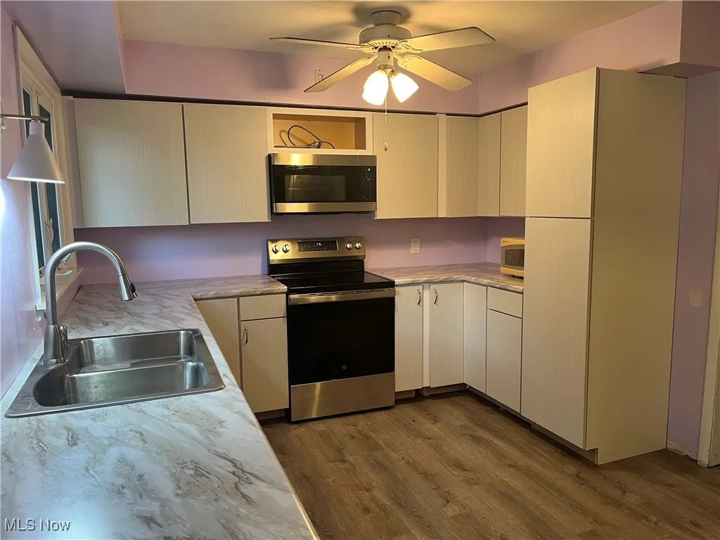 Newly remodeled with stainless appliances, laminate flooring and ceiling fan.