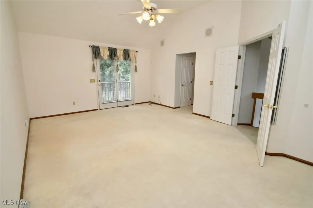 Master bedroom features walk in closet and a separate vanity area with full sink.