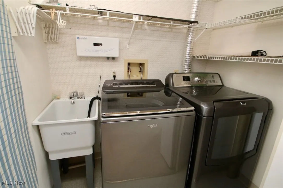Second Floor Laundry area with washing machine and dryer