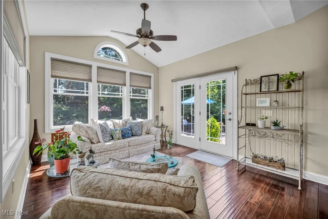 Sunroom with french doors and lofted ceiling