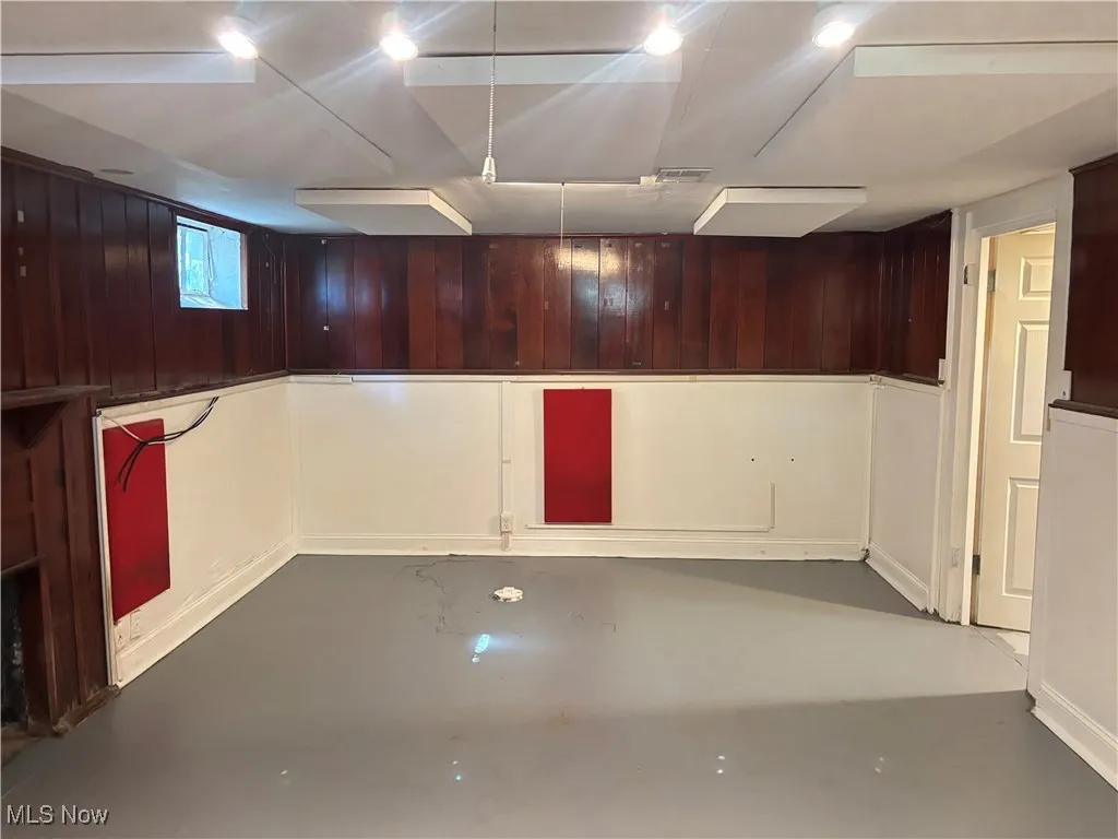 Below grade area with wooden walls