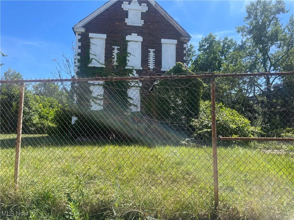 View of front of property with brick siding