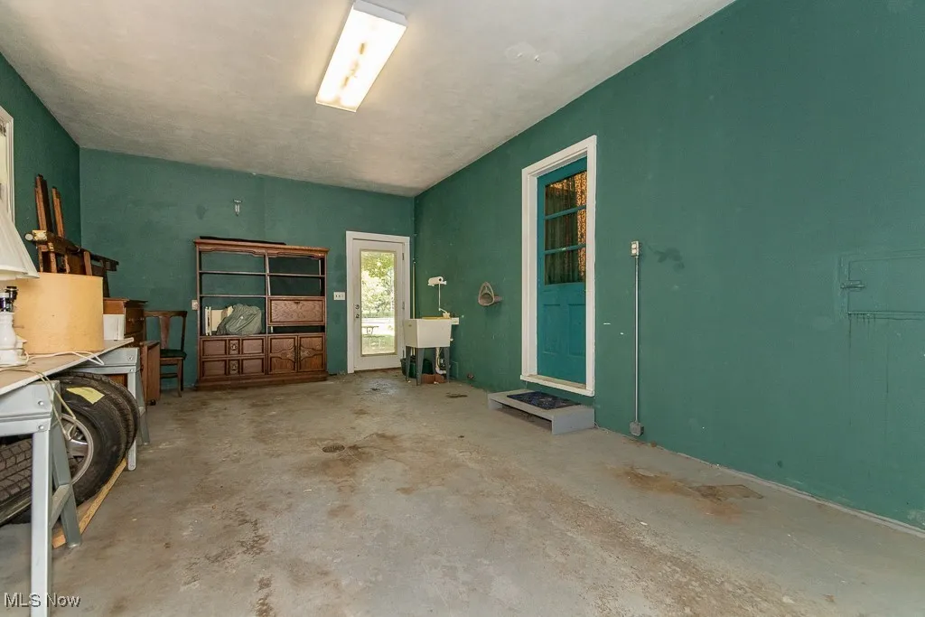 Back area of garage with sink