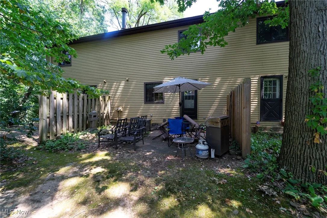 Back of house with a patio area