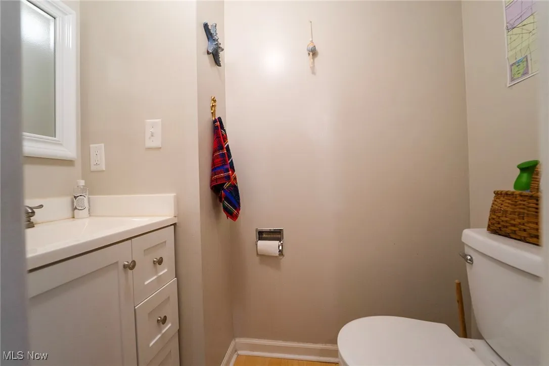 Bathroom featuring toilet and vanity