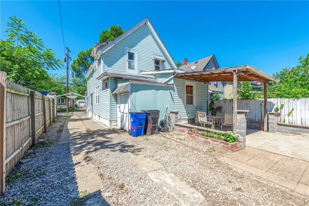 Rear view of house with a patio