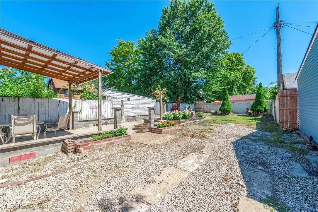 View of fenced backyard