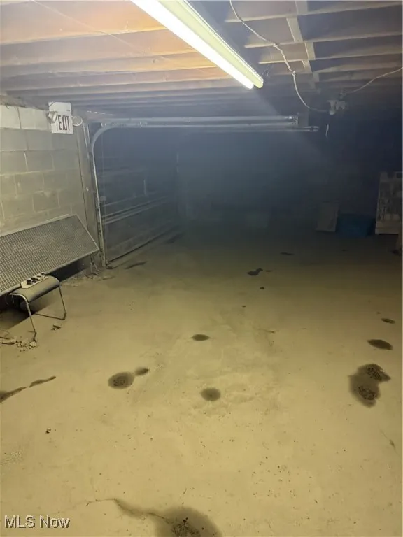 Basement featuring a garage