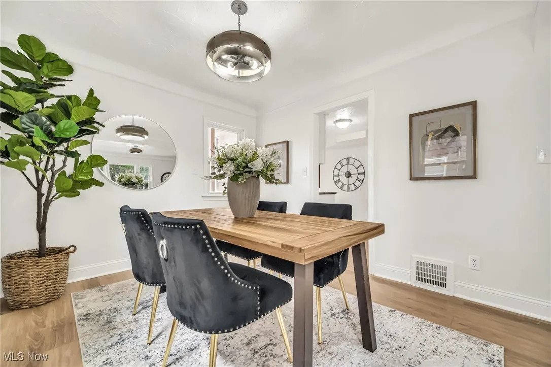 Dining space with light wood-style flooring