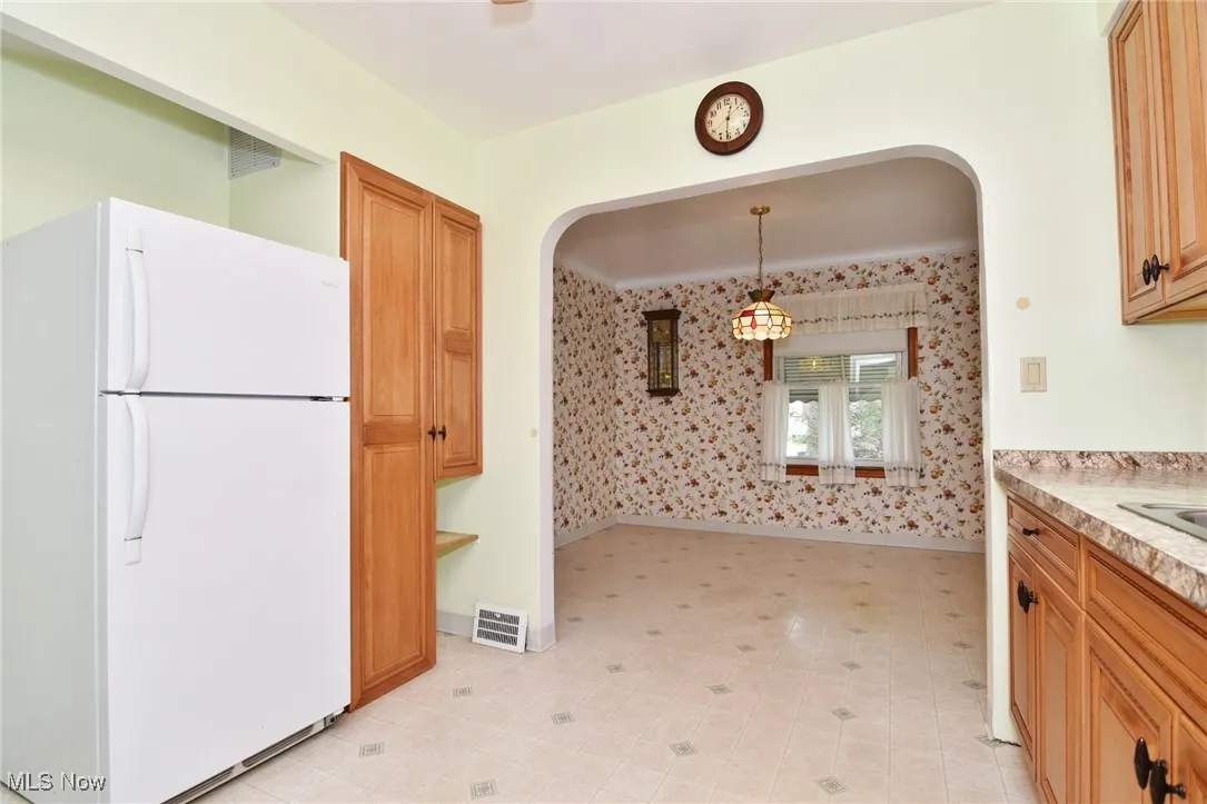 Kitchen was updated with beautiful cabinets.