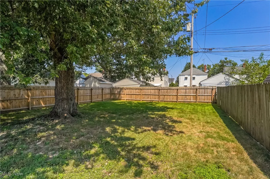 View of fenced backyard