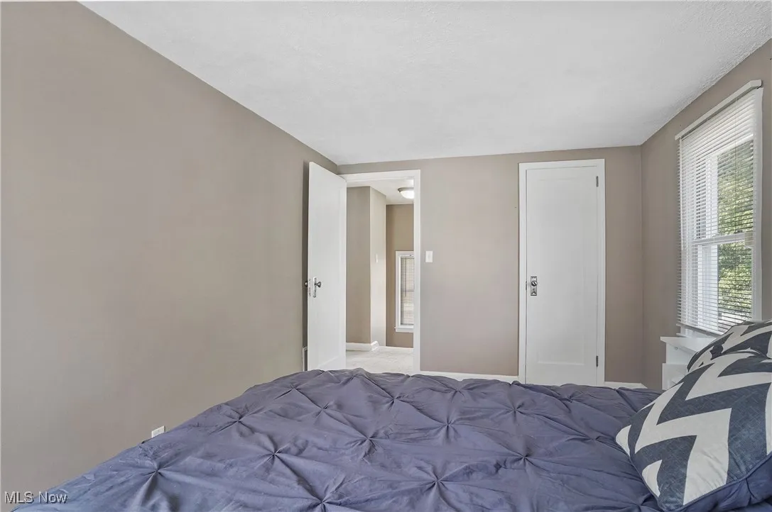 Bedroom featuring baseboards