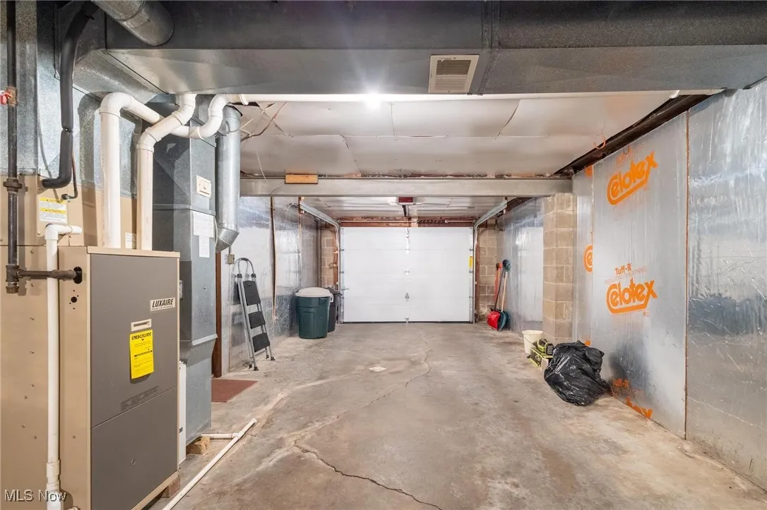Garage featuring heating unit