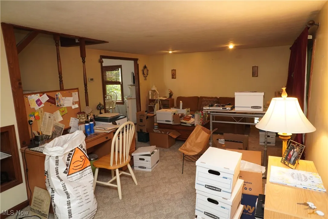 Office featuring light colored carpet