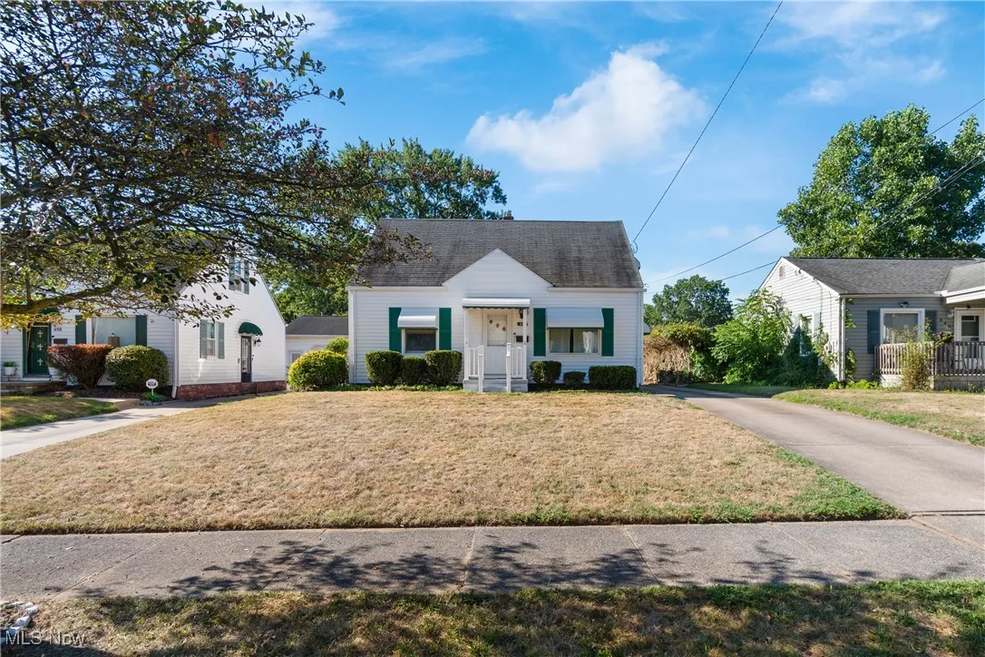 View of front of house with a front yard