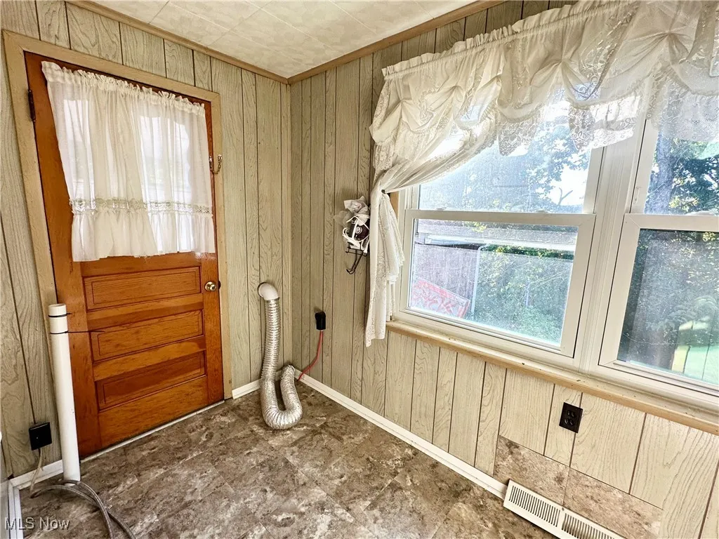 Doorway to outside and plenty of natural light