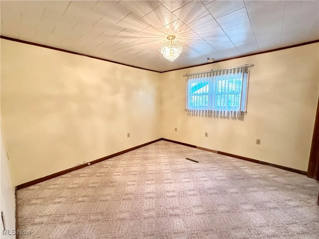 Bedroom featuring carpet