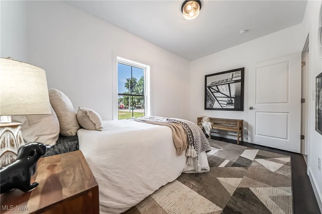 First floor bedroom or office with wood-style floors