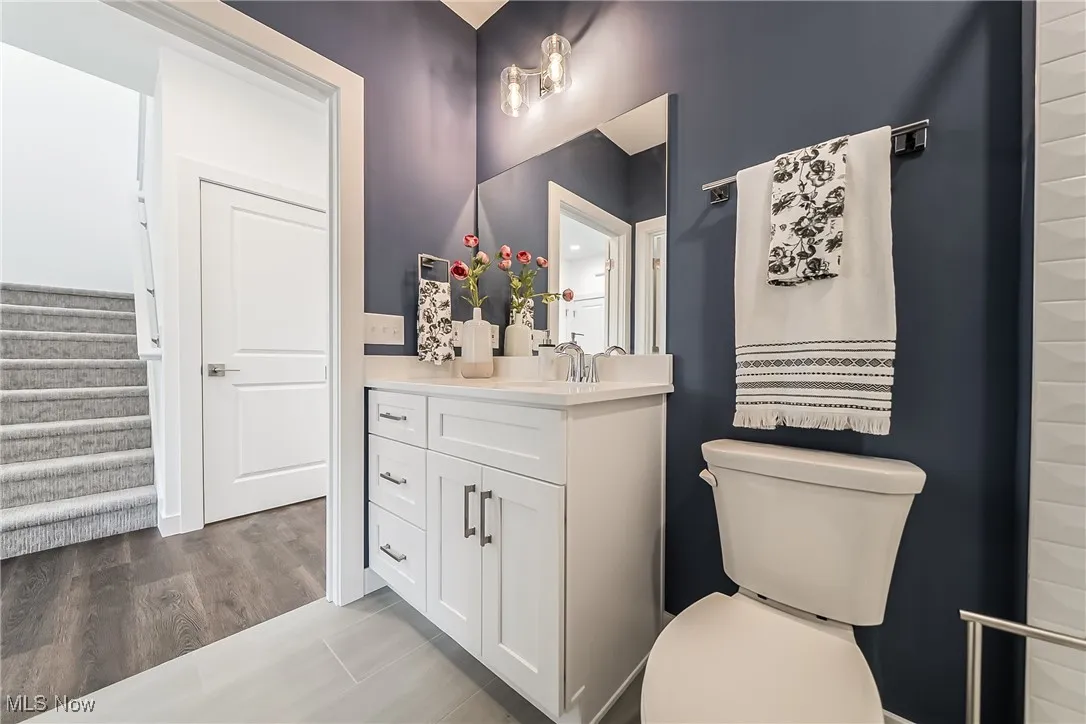 Bathroom with vanity and toilet