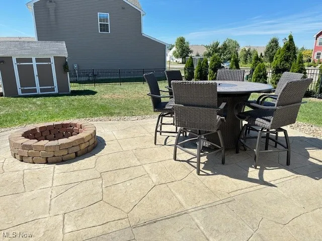 Beautiful stamped patio with built in fire pit